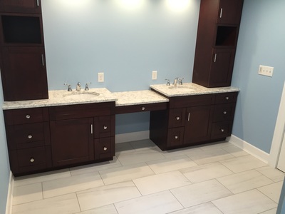 Remodeled bathroom, sink side, dual sinks.