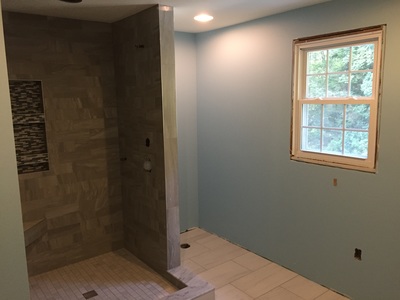 Bathroom, wide view, remodeling in progress.