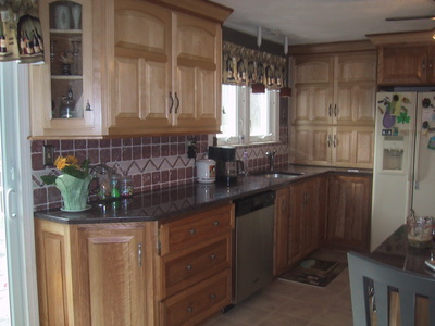 Remodeled kitchen, view of sink/dishwasher side.