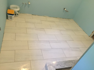 Bathroom, remodeled tile floor.